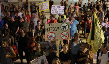 Israelis protest as rising COVID-19 cases trigger new rules