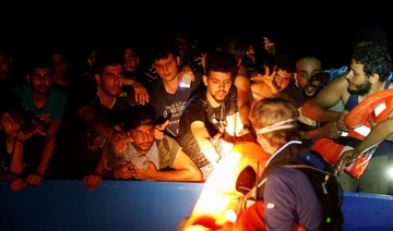 Rescuers pull 394 migrants from dangerously overcrowded boat off Tunisia