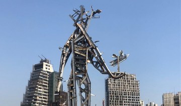 Lebanese artist Nadim Karam creates memorial sculpture at Beirut Port