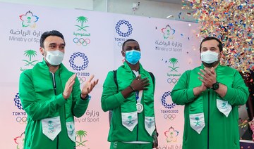 Saudi Arabian Olympic Committee arrives at King Abdulaziz International Airport in Jeddah as they returned from Japan. (Twitter/@saudiolympic)