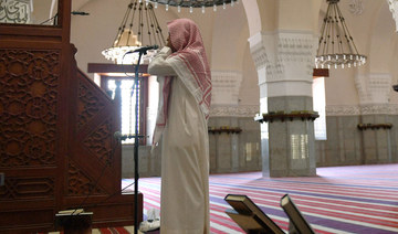 In this file photo taken on April 28, 2020, muezzin of the Jaffali mosque in Jeddah, calls for prayer at the mosque. (AFP)