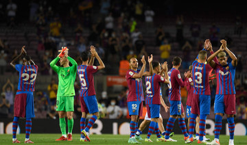 Barcelona's players celebrate during the Spanish League football match between Barcelona and Real Sociedad at the Camp Nou stadium in Barcelona on August 15, 2021. (AFP) Barcelona, Catalonia, (AFP)