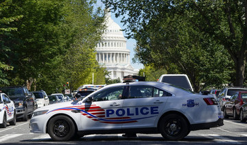 A Metropolitan Police Department cruiser blocks a street near the US Capitol and a Library of Congress building in Washington on Thursday, Aug. 19, 2021. (AP)