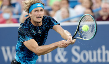 Alexander Zverev returns a shot to Stefanos Tsitsipas during the semifinals of the Western & Southern Open on August 21, 2021 in Mason, Ohio. (Matthew Stockman/Getty Images/AFP)