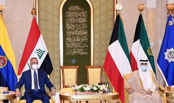 Emir of Kuwait Sheikh Nawaf Al-Ahmed Al-Jaber Al-Sabah (R) receives Iraq’s Prime Minister Mustafa Al-Kadhimi in Kuwait City. (AFP via KUNA)