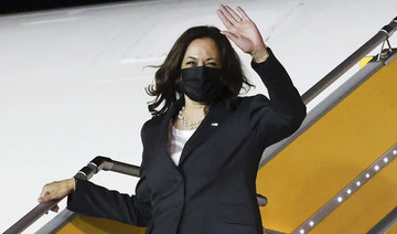 US Vice President Kamala Harris disembarks from Air Force Two, as she arrives for the second leg of her Asia trip, at Noi Bai International Airport, in Hanoi, Vietnam, on August, 24, 2021. (AFP)