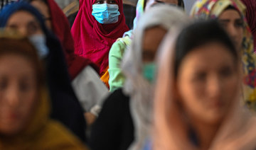 Afghan women take part in a gathering at a hall in Kabul on August 2, 2021 against the claimed human rights violations on women by the Taliban regime in Afghanistan. (AFP)