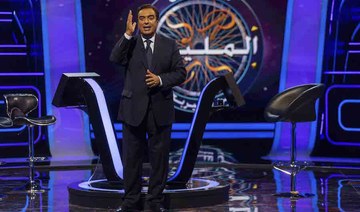 Lebanese Information Minister George Kordahi hosts a special episode of the Arabic version of "Who wants to be a Millionaire?" for MBC Group's 30th anniversary in Lisbon, Portugal. (MBC)