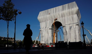‘Really alive’: France unveils wrapped Arc de Triomphe
