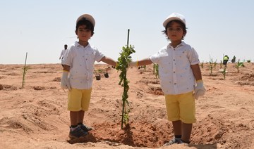 Thousands of volunteers in Riyadh help plant trees in shape of map of Saudi Arabia