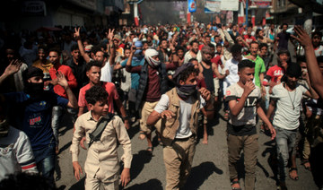 Yemen PM returns to Aden amid protests, plunging currency