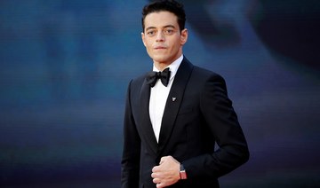  US-Egyptian actor Rami Malek hit the red carpet in a Prada suit. (AFP)