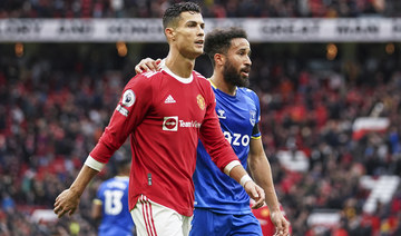 Manchester United's Cristiano Ronaldo and Everton's Andros Townsend walk off the pitch at the end of the match at Old Trafford. (AP)