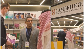 Joshua O’Neil, area coordinator of CUP Middle East, and Walid Shawky, CUP educational consultant, speaking to Arab News at Riyadh book fair. (AN Photos)