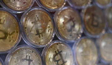 Bitcoin tops $66,000 as crypto goes mainstream