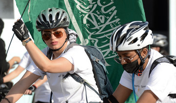 Saudi women take part in a cycling race to mark World Obesity Day celebration in Riyadh's Princess Nourah University. (AFP/File Photo)