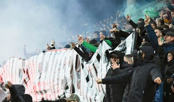Saint-Etienne match delayed after fans bombard and invade pitch