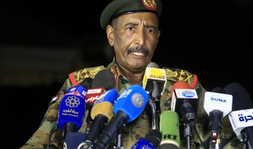 Sudan military leader denies staging coup day after government deposed