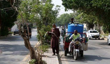 As temperatures rise in Karachi, gardener cares for 4,000 trees ‘like my children’