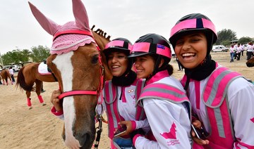 Participants take part in the Pink Caravan Ride in Dubai on February 28, 2018, a UAE breast cancer initiative. (AFP/File Photo)