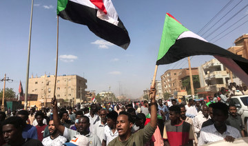 Protesters march in Khartoum on Oct. 30, 2021, against the Sudanese military's recent seizure of power and ousting of the civilian government. (REUTERS/Mohamed Nureldine)