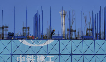 China's economy slows as Beijing wrestles with debt