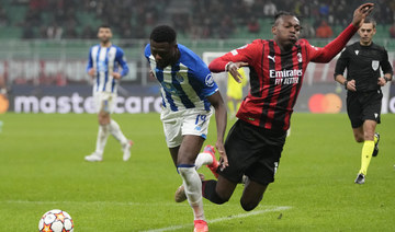 Milan draws 1-1 against Porto to keep faint CL hopes alive