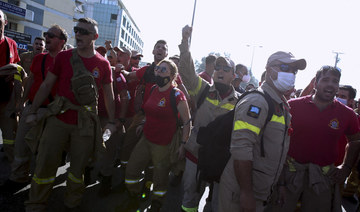 Greek firefighters clash with police at climate ministry