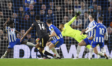 Newcastle United's Isaac Hayden scores their equalizer against Brighton & Hove Albion at the AMEX Stadium. (Reuters)