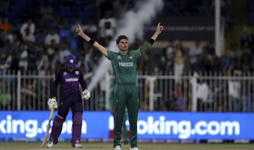 Pakistan's Shaheen Afridi celebrates the dismissal of Scotland's Michael Leask during the T20 World Cup match between Pakistan and Scotland in Sharjah. (AP)