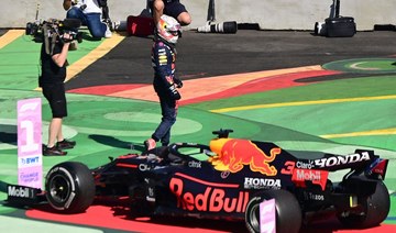 Red Bull's Dutch driver Max Verstappen walks out of his car after winning the F1 Mexico Grand Prix at the Hermanos Rodriguez racetrack in Mexico City. (AFP)