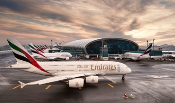 Emirates gets more aid from Dubai as first half losses narrow