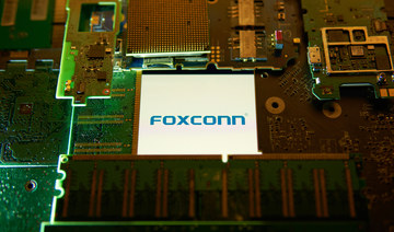 Global computer chip shortage to run into the second half of 2022, warns Apple supplier Foxconn 