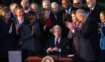 Biden celebrates rare win with US infrastructure bill signing