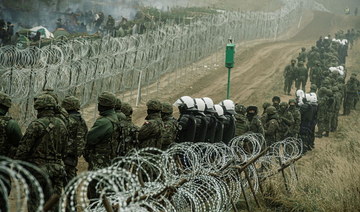 Polish forces fire tear gas at migrants on Belarus border