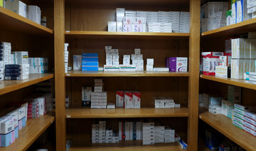 Lebanese cry in pharmacies after subsidies on medicine are lifted