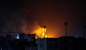 Smoke rises from the site of Saudi-led air strikes in Sanaa, Yemen November 27, 2021. (REUTERS)