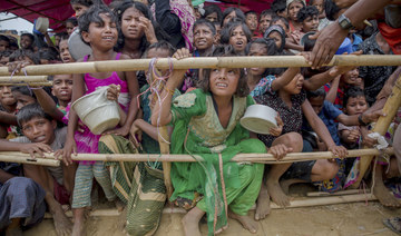 Rohingya Muslim children refugees, who crossed over from Myanmar into Bangladesh, wait squashed against each other to receive food handouts at Thaingkhali refugee camp, Bangladesh on Oct. 21, 2017. (AP)