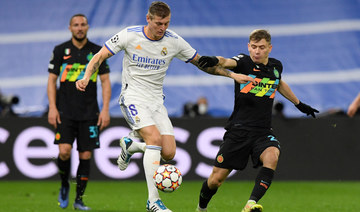 Real Madrid dispatch 10-man Inter to go through top of the group