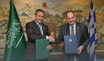 Saudi Minister of Transport and Logistics Services Saleh Al-Jasser and Greek Minister of Maritime Affairs and Island Policy Giannis Plakiotakis sign an agreement. (SPA)