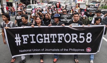 Filipino journalist shot dead while watching TV in store