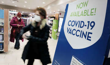 A pharmacy in Grand Central Terminal advertises the COVID-19 vaccine on December 09, 2021 in New York City. (AFP)