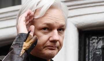 In this file photo taken on May 19, 2017, Wikileaks founder Julian Assange gestures as he speaks on the balcony of the Embassy of Ecuador in London. (AFP)