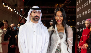 Mohammed Al-Turki, chairman of the Festival Committee, with British model Naomi Campbell. (AFP)