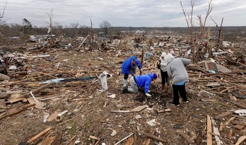 Towns in mourning while digging out from deadly US tornadoes