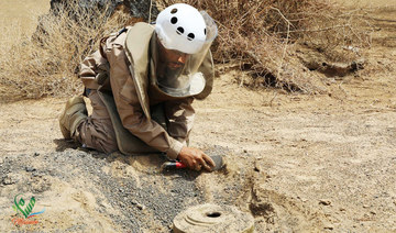 Land mines scattered by Yemen’s Houthi rebels remain largely unmapped and a threat across the nation, those involved in their eradication say. (WAM via AP)