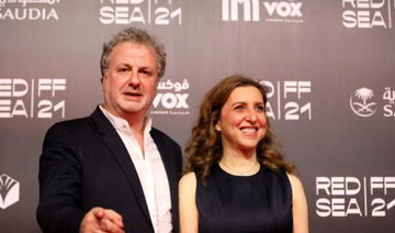 Lebanese filmmakers Khalil Joreige and Joana Hadjithomas on the red carpet before the screening of their film ‘Memory Box’ on the fourth day of the inaugural Red Sea International Film Festival in Jeddah. (AFP)