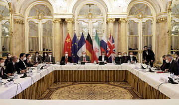 Deputy Secretary General of the European External Action Service (EEAS) Enrique Mora and Iran's chief nuclear negotiator Ali Bagheri Kani and delegations wait for the start of a meeting of the JCPOA Joint Commission in Vienna. (Reuters)