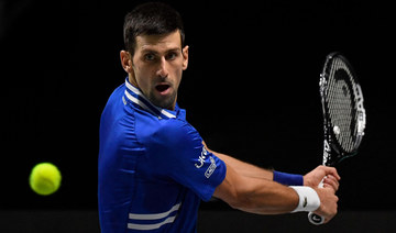 Djokovic ‘trying’ to get to Australian Open, say teammates