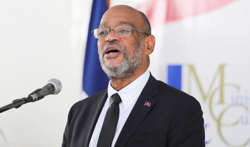 Haitian Prime Minister Ariel Henry speaks at a ceremony for his inauguration as Minister of Culture and Communication, in Port-au-Prince, Haiti November 26, 2021. (REUTERS)
